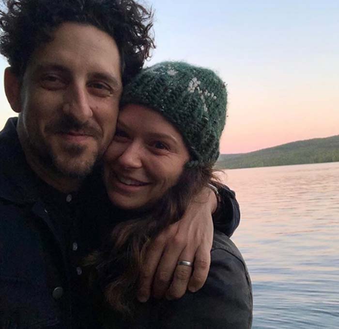 Adam Shapiro and Katie Lowes taking a photo together.